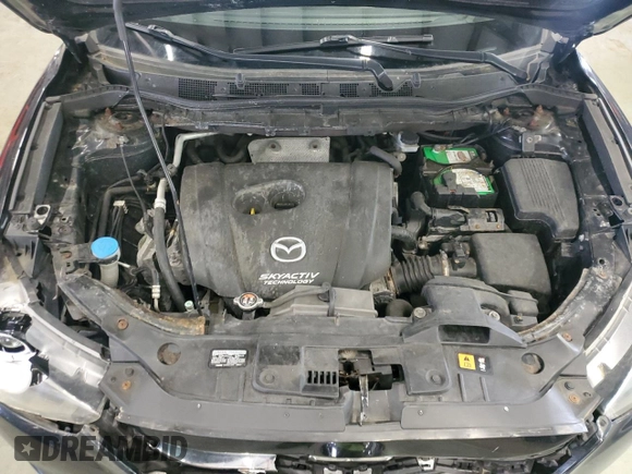2014 Mazda CX-5 Sport с VIN JM3KE2BE0E0367493, выставлен на аукционе Copart как лот 57324195 с пробегом 103 367 миль миль и Списание • Salvage title. История ставок и продаж доступна на DreamBid. Изображение 12.