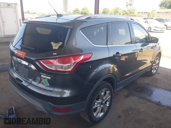 2015 Ford Escape Titanium with VIN 1FMCU0J92FUA20469, listed as a IAAI auction lot 42510293 with 161,466 mi miles and . Bid and sale history available at DreamBid. Image 4.