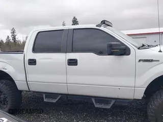 2014 Ford F-150 XL with VIN 1FTFW1EF1EKF65204, listed as a IAAI auction lot 41669195 with 84,882 mi miles. Bid and sale history available at carsss.com. Image 14.