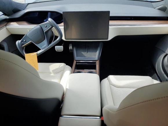 2022 Tesla Model S with VIN 5YJSA1E5XNF471212, listed as a Copart auction lot 57384025 with Not provided miles and Salvage title. Bid and sale history available at DreamBid. Image 8.