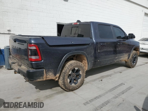2020 Ram 1500 Rebel with VIN 1C6SRFLTXLN118580, listed as a Copart auction lot 54585955 with 39,028 mi miles and Salvage title. Bid and sale history available at DreamBid. Image 3.