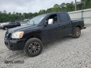 2004 Nissan Titan LE with VIN 1N6AA07A34N573514, listed as a Copart auction lot 54497765 with 240,033 mi miles and Salvage title. Bid and sale history available at DreamBid. Image 1.