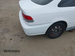 1997 Honda Civic EX z VIN 1HGEJ8143VL028501, wystawiony jako IAAI lot #42058395 z przebiegiem 129 401 mil mil oraz . Historia ofert i sprzedaży dostępna na DreamBid. Obrazek 12.