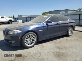 2013 BMW 5 Series 535i with VIN WBAFR7C56DC827227, listed as a Copart auction lot 50571785 with 104,128 mi miles and Clean Title. Bid and sale history available at DreamBid. Image 1.