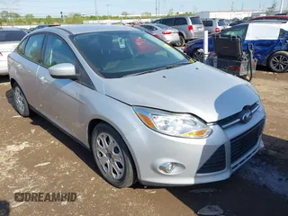 2012 Ford Focus SE with VIN 1FAHP3F20CL372391, listed as a IAAI auction lot 42100970 with 126,112 mi miles and . Bid and sale history available at DreamBid. Image 1.
