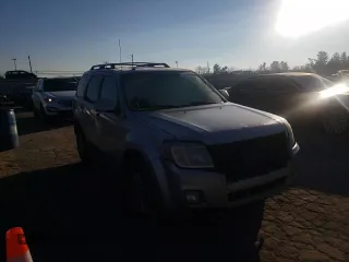2008 Mercury Mariner Premier z VIN 4M2CU97108KJ43593, wystawiony jako Copart lot #62006105 z przebiegiem 124 233 mil mil oraz Szkoda całkowita • Salvage title. Historia ofert i sprzedaży dostępna na DreamBid. Obrazek 11.