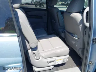 2013 Honda Odyssey Touring with VIN 5FNRL5H94DB069716, listed as a IAAI auction lot 41901369 with 243,492 mi miles. Bid and sale history available at carsss.com. Image 8.