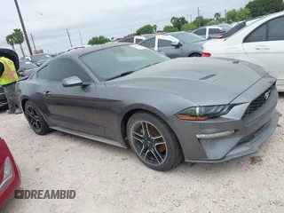 2021 Ford Mustang EcoBoost z VIN 1FA6P8TH9M5141038, wystawiony jako IAAI lot #41965588 z przebiegiem 35 344 mil mil oraz . Historia ofert i sprzedaży dostępna na DreamBid. Obrazek 13.
