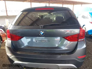 2013 BMW X1 28i with VIN WBAVM1C57DVW42096, listed as a IAAI auction lot 41572971 with 156,999 mi miles. Bid and sale history available at carsss.com. Image 15.