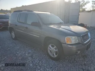 2006 GMC Envoy SLE with VIN 1GKET16S166171992, listed as a Copart auction lot 76676894 with 203,713 mi miles and Salvage Title. Bid and sale history available at DreamBid. Image 4.