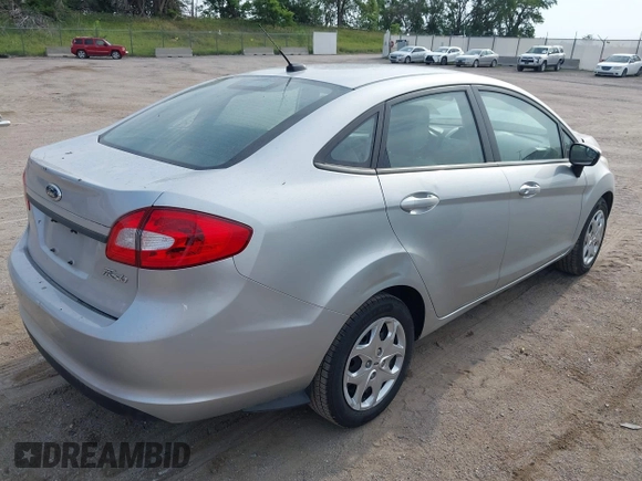 2013 Ford Fiesta S with VIN 3FADP4AJ9DM177022, listed as a IAAI auction lot 42535909 with 174,631 mi miles and . Bid and sale history available at DreamBid. Image 4.
