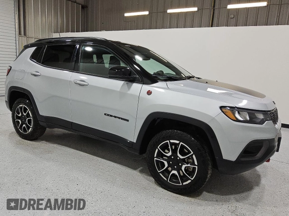 2024 Jeep Compass Trailhawk with VIN 3C4NJDDN5RT149827, listed as a Copart auction lot 55865465 with 31,565 mi miles and Clean title. Bid and sale history available at DreamBid. Image 4.