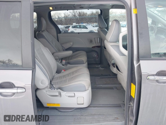 2011 Toyota Sienna XLE AAS with VIN 5TDYK3DC5BS138281, listed as a IAAI auction lot 41381494 with 194,635 mi miles and . Bid and sale history available at DreamBid. Image 8.