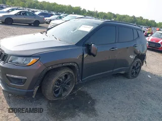 2018 Jeep Compass Latitude with VIN 3C4NJDBB0JT395844, listed as a IAAI auction lot 42405343 with 140,220 mi miles and . Bid and sale history available at DreamBid. Image 6.