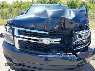 2018 Chevrolet Tahoe LT with VIN 1GNSCBKC0JR138385, listed as a IAAI auction lot 41977300 with 104,987 mi miles and . Bid and sale history available at DreamBid. Image 10.