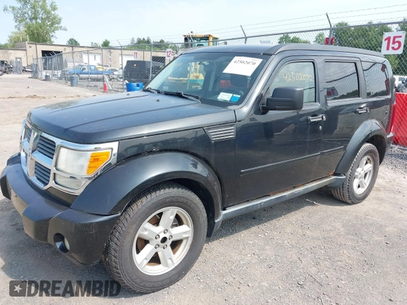 2008 Dodge Nitro SXT z VIN 1D8GU28K08W151127, wystawiony jako IAAI lot #42502070 z przebiegiem 145 972 mil mil oraz . Historia ofert i sprzedaży dostępna na DreamBid. Obrazek 2.