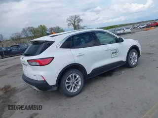 2020 Ford Escape SE with VIN 1FMCU9G67LUC31633, listed as a IAAI auction lot 42173290 with 136,937 mi miles and . Bid and sale history available at DreamBid. Image 4.