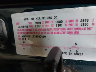 2003 Kia Sedona LX with VIN KNDUP131336390410, listed as a IAAI auction lot 41602426 with 170,613 mi miles. Bid and sale history available at carsss.com. Image 9.