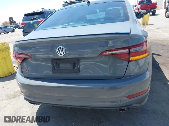 2019 Volkswagen Jetta GLI S z VIN 3VW6T7BU9KM153175, wystawiony jako IAAI lot #42099719 z przebiegiem 90 608 mil mil oraz . Historia ofert i sprzedaży dostępna na DreamBid. Obrazek 16.
