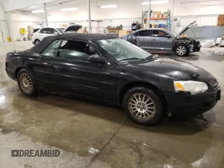 2004 Chrysler Sebring LXi with VIN 1C3EL55R44N414221, listed as a Copart auction lot 88304615 with 198,945 mi miles and Salvage Title. Bid and sale history available at DreamBid. Image 4.