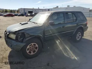 2004 Isuzu Rodeo S with VIN 4S2CK58W344303242, listed as a Copart auction lot 75339714 with 106,659 mi miles and Salvage Title. Bid and sale history available at DreamBid. Image 1.
