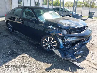2023 Honda Civic EX with VIN 2HGFE1F73PH320247, listed as a IAAI auction lot 42148175 with 40,454 mi miles and . Bid and sale history available at DreamBid. Image 1.