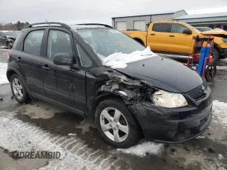2012 Suzuki SX4 Crossover with VIN JS2YB5A30C6306884, listed as a Copart auction lot 86396074 with 91,557 mi miles and Salvage Title. Bid and sale history available at carsss.com. Image 4.