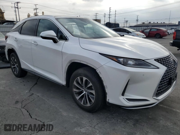 2020 Lexus RX with VIN 2T2AZMAA9LC160005, listed as a Copart auction lot 86916644 with 63,699 mi miles and Salvage Title. Bid and sale history available at carsss.com. Image 4.