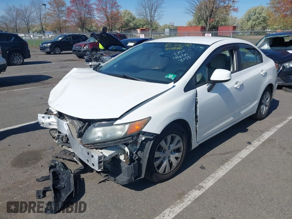 2012 Honda Civic LX with VIN 19XFB2F54CE348155, listed as a IAAI auction lot 42064540 with 238,636 mi miles and . Bid and sale history available at DreamBid. Image 17.