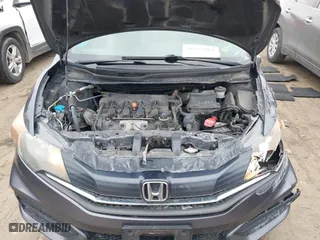 2015 Honda Civic Coupe LX with VIN 2HGFG3B58FH504642, listed as a IAAI auction lot 41672862 with 169,192 mi miles. Bid and sale history available at carsss.com. Image 10.