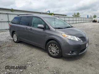 2012 Toyota Sienna XLE AAS with VIN 5TDYK3DC6CS189399, listed as a Copart auction lot 57188555 with Not provided miles and Clean title. Bid and sale history available at DreamBid. Image 4.