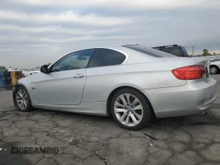 2013 BMW 3 Series 328i with VIN WBAKE3C58DE771511, listed as a Copart auction lot 82279174 with 106,193 mi miles and Salvage Title. Bid and sale history available at DreamBid. Image 2.