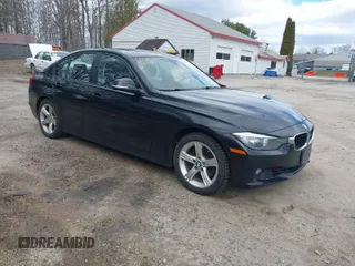 2013 BMW 3 Series 328i xDrive with VIN WBA3B5C5XDF597184, listed as a IAAI auction lot 42060785 with 205,559 mi miles. Bid and sale history available at carsss.com. Image 1.