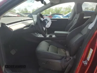 2024 Tesla Model Y Long Range z VIN 7SAYGDEE6RA261108, wystawiony jako Copart lot #55252805 z przebiegiem 16 932 mil mil oraz Szkoda całkowita • Salvage title. Historia ofert i sprzedaży dostępna na DreamBid. Obrazek 7.