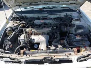 1990 Toyota Camry z VIN JT2SV21E9L0352085, wystawiony jako IAAI lot #42419588 z przebiegiem 138 425 mil mil oraz . Historia ofert i sprzedaży dostępna na DreamBid. Obrazek 10.