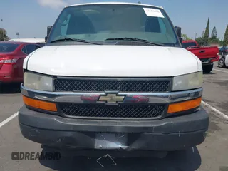 2014 Chevrolet Express Passenger LT with VIN 1GAZG1FG4E1154654, listed as a IAAI auction lot 42605616 with 155,896 mi miles and . Bid and sale history available at DreamBid. Image 6.