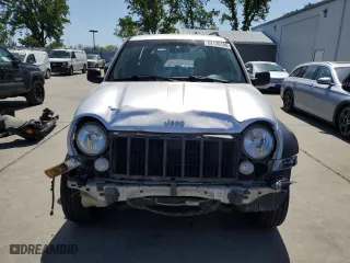 2005 Jeep Liberty Sport with VIN 1J4GK48K95W682154, listed as a Copart auction lot 52176155 with 164,743 mi miles and Salvage Title. Bid and sale history available at carsss.com. Image 5.