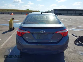 2014 Toyota Corolla L with VIN 5YFBURHE5EP005970, listed as a IAAI auction lot 42131661 with 115,840 mi miles and . Bid and sale history available at DreamBid. Image 17.