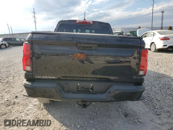 2024 Chevrolet Colorado 4WD Z71 with VIN 1GCPTDEK0R1112392, listed as a Copart auction lot 77392414 with 5,557 mi miles and Salvage Title. Bid and sale history available at carsss.com. Image 6.