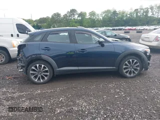2019 Mazda CX-3 Touring z VIN JM1DKFC76K0446440, wystawiony jako IAAI lot #42314401 z przebiegiem 57 901 mil mil oraz . Historia ofert i sprzedaży dostępna na DreamBid. Obrazek 13.