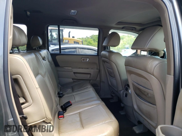 2009 Honda Pilot EX-L z VIN 5FNYF48589B003297, wystawiony jako Copart lot #57162245 z przebiegiem 191 883 mil mil oraz Szkoda całkowita • Salvage title. Historia ofert i sprzedaży dostępna na DreamBid. Obrazek 11.