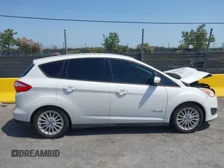 2013 Ford C-Max SE z VIN 1FADP5AU1DL518916, wystawiony jako IAAI lot #42452252 z przebiegiem 250 862 mil mil oraz . Historia ofert i sprzedaży dostępna na DreamBid. Obrazek 14.