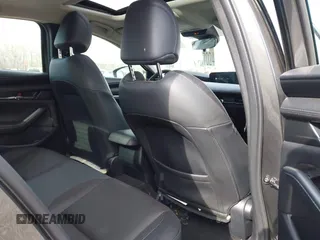2023 Mazda 3 S Premium with VIN 3MZBPBDM8PM373434, listed as a IAAI auction lot 41234729 with 9,387 mi miles and . Bid and sale history available at DreamBid. Image 8.