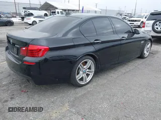 2015 BMW 5 Series 535i with VIN WBA5B1C55FG128387, listed as a IAAI auction lot 41885806 with 94,734 mi miles and . Bid and sale history available at carsss.com. Image 4.