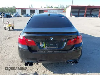 2014 BMW M5 z VIN WBSFV9C54ED593281, wystawiony jako IAAI lot #42063656 z przebiegiem 104 517 mil mil oraz . Historia ofert i sprzedaży dostępna na DreamBid. Obrazek 16.