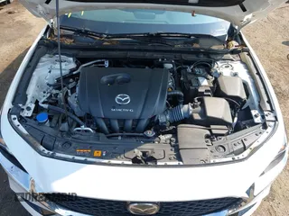 2022 Mazda 3 Carbon Edition with VIN 3MZBPACL0NM318573, listed as a IAAI auction lot 42403393 with 8,762 mi miles and . Bid and sale history available at DreamBid. Image 10.