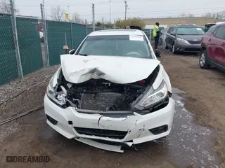 2016 Nissan Altima 2.5 SL with VIN 1N4AL3AP5GC137636, listed as a IAAI auction lot 42026036 with 149,231 mi miles. Bid and sale history available at carsss.com. Image 12.