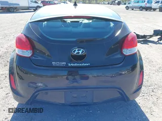 2013 Hyundai Veloster w/Gray Int with VIN KMHTC6AD4DU131242, listed as a IAAI auction lot 42074517 with 76,713 mi miles and . Bid and sale history available at DreamBid. Image 16.