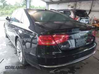 2012 Audi A8 with VIN WAUAVAFD9CN006499, listed as a IAAI auction lot 42461402 with 57,232 mi miles and . Bid and sale history available at DreamBid. Image 3.