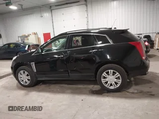 2015 Cadillac SRX with VIN 3GYFNAE36FS519604, listed as a IAAI auction lot 41215296 with 70,954 mi miles and . Bid and sale history available at DreamBid. Image 14.